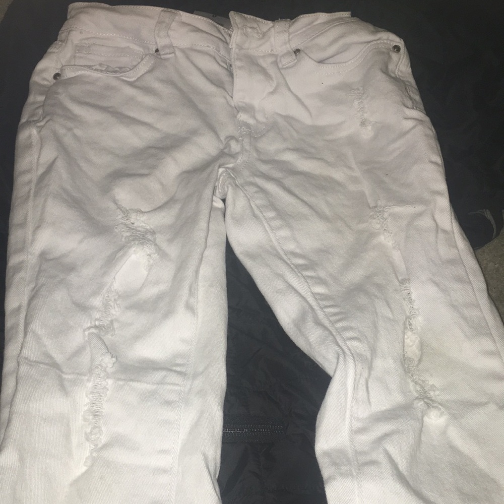 White ripped jeans